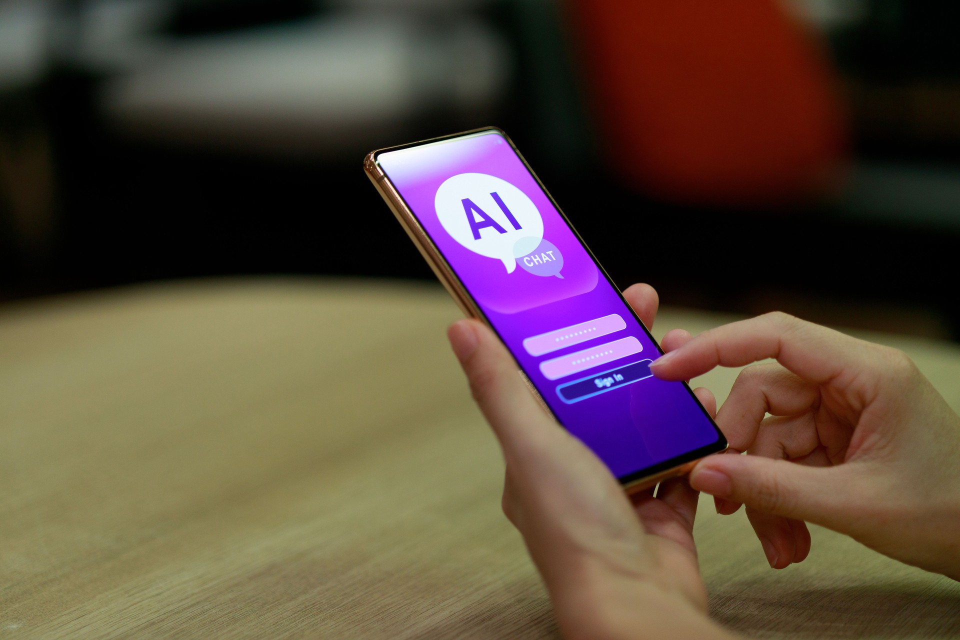 A woman is using her mobile phone to log in and chat with an artificial intelligence chatbot. This application represents a global connection and the latest innovation in AI technology.